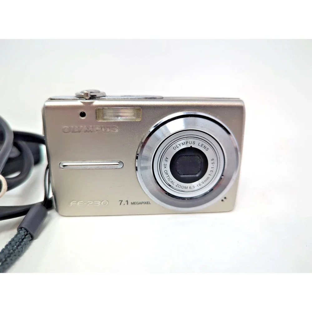 Olympus FE-230 7.1 MP Digital Camera - Silver Compact PARTS OR REPAIR battery